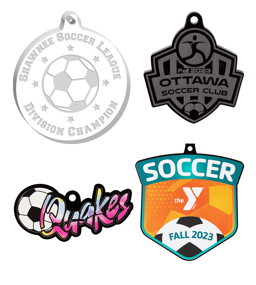 Group image of soccer custom acrylic medals.